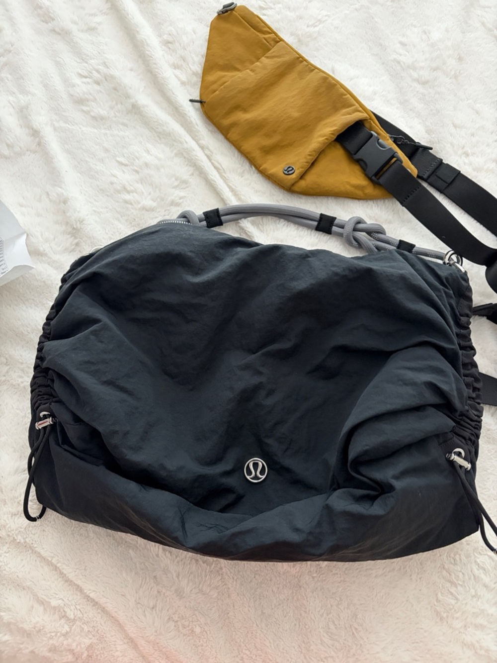 lululemon athletica Black Duffel with Mustard Sling Accent crossbody
